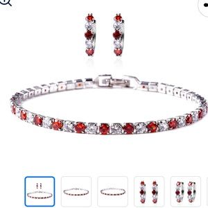 Set of lab created rubies bracelet, earrings and two rings